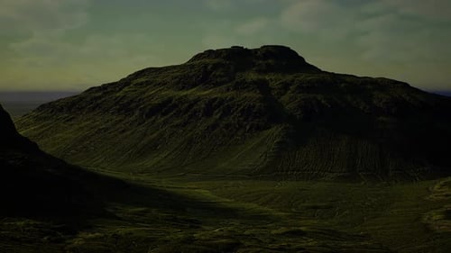 Sunrise Illuminates Peaceful Hill with Moss and Grass Textures