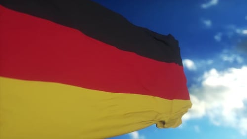 Realistic Waving German Flag Against Blue Sky