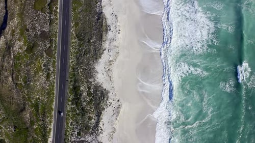 Coastal Road Beside a Sandy Beach from Above