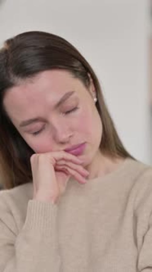 Portrait of Sleepy Young Woman taking Nap at Home, Vertical Video