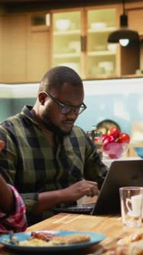 Vertical Video Black Preoccupied Father Being Focused on His Remote Work