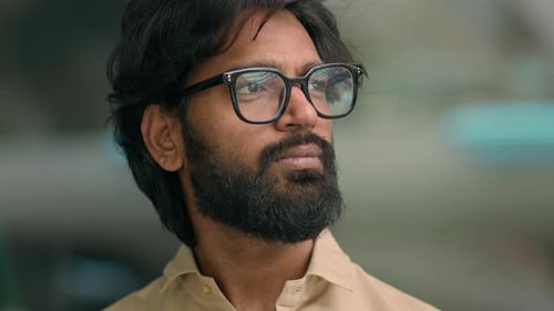 Serious Thoughtful Arabian Bearded Man in Glasses in Office Corporate Company Thinking Looking Away