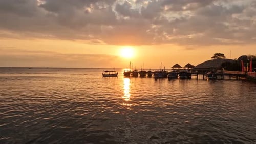Beautiful timelapse of sunset view over sea surface beautiful wave. Amazing light sunset or sunrise