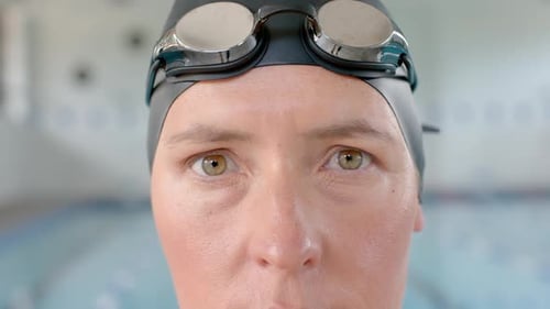 Close Up of Smiling Swimmer Wearing Swim Cap
