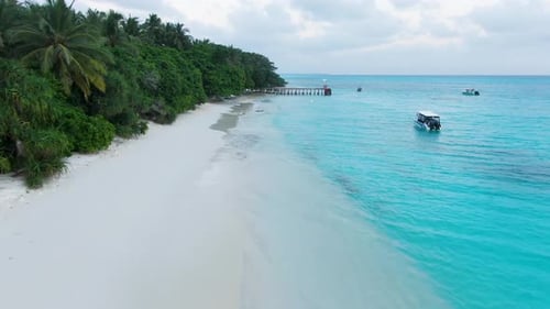 Aerial view of tropical beach and turquoise water, Maldives.
