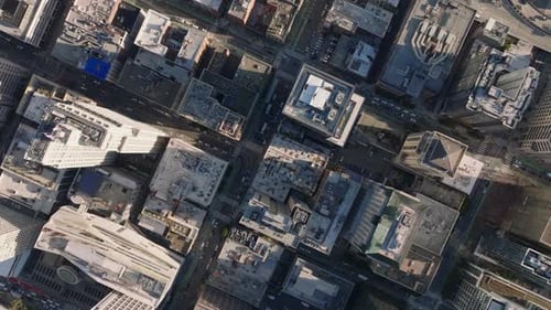 Top Down Shot of Traffic in Streets in Urban Borough Blocks of Buildings Lined By Regular Street