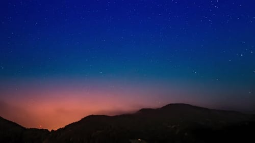 Starry Night Time Lapse Over Mountains