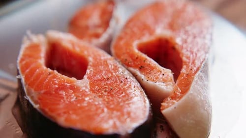 Close-up of Fresh Salmon Seasoned with Pepper