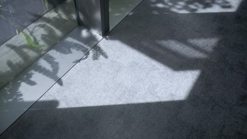 Light and shadow on the floor in the office building.