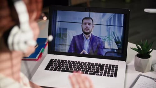 Woman Participating in a Remote Corporate Video Call