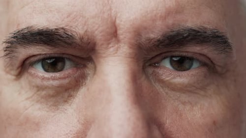 Macro Detailed Shot of Adult Eyes Opening