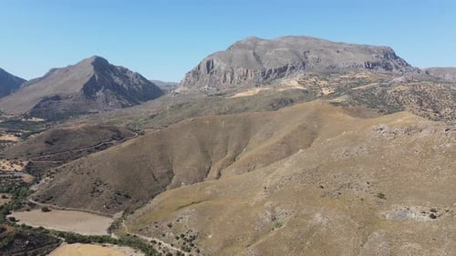 Aerial panoramic view of a dramatic landscape formed by mountains, valleys and gorges at the south o