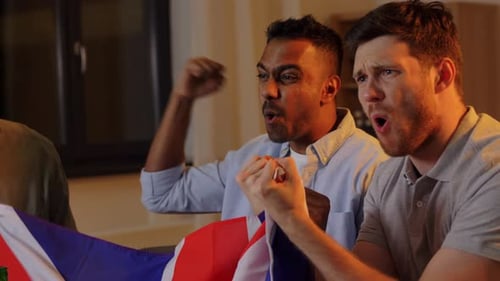 Friends celebrate watching sports with a British flag