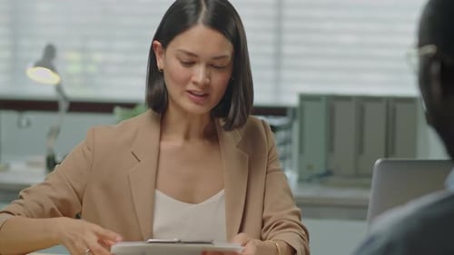 Female HR Manager Interviewing Job Candidate in Office