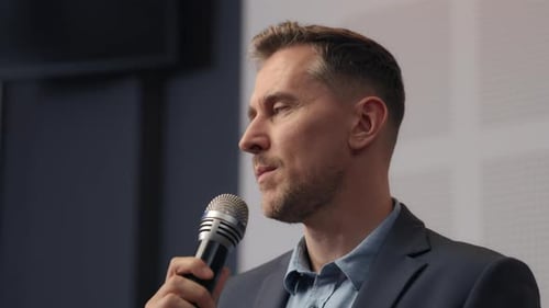 Speech of Male Employee at Business Conference for Office Workers. Speaker Talks