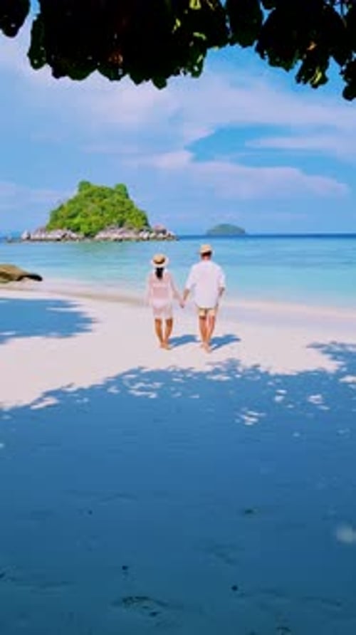 Couple of Men and Women Walking on the Beach of Koh Lipe Thailand