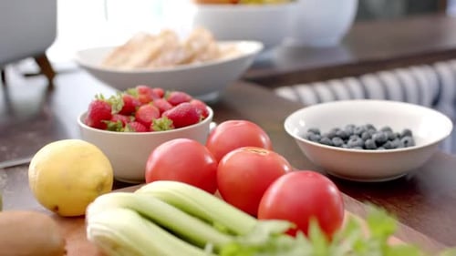 Fresh Fruits and Vegetables on Kitchen Table