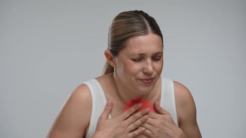 Woman Experiencing Throat and Chest Pain