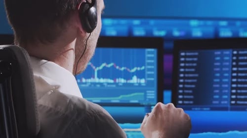 Trader Works in Office Using Workstation and Analysis Technology Workplace of Professional Crypto