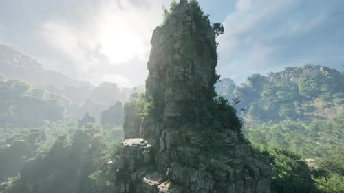 A Majestic Rock Formation Standing Tall Amidst a Lush Forest in China