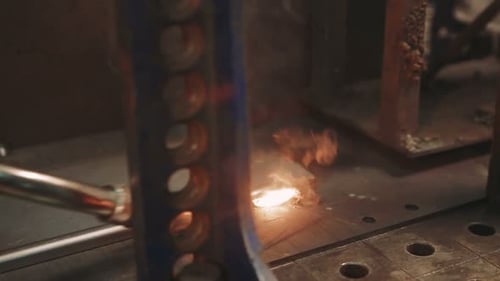 Welder sparks during industrial metalworking process