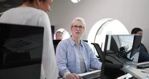 Senior woman on computing course