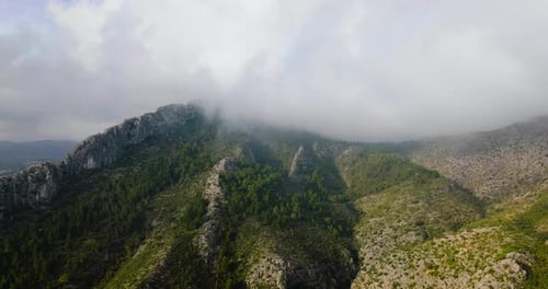 Beautiful Rocky Mountain Landscape in Summer Cloudy Sky