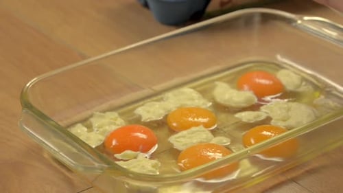Adding Butter to Egg Yolks in Glass Pan