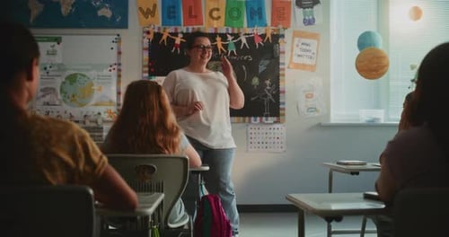 Female Teacher Conducting Lesson Educating Renewable Energy to Elementary School Students