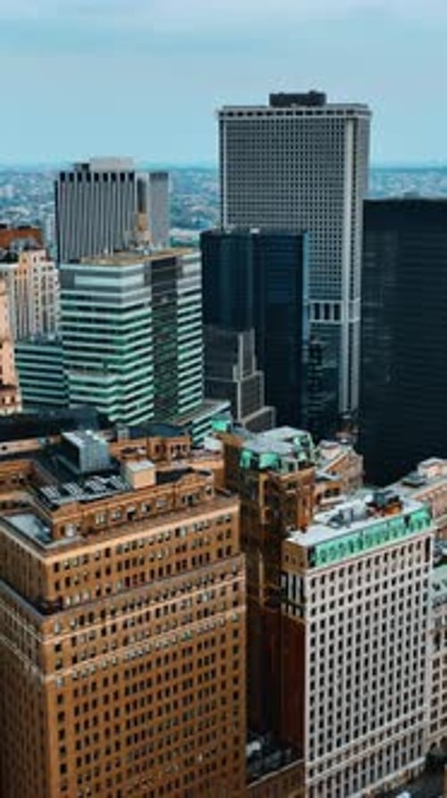 Approaching the tops of various skyscrapers in the New York Midtown.