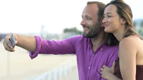 Young Couple Taking Selfie Photo with Cellphone Near Beach in City Adult