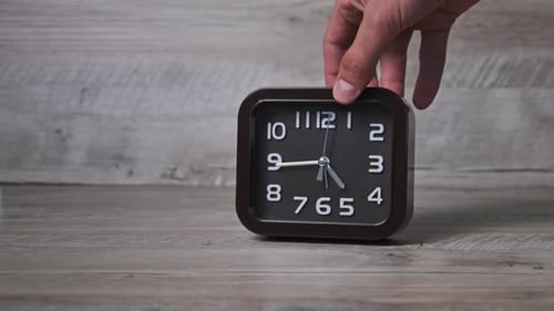 Alarm Clock on Wood Surface