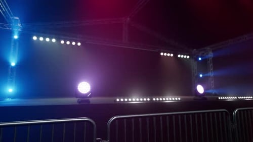 Concert Stage with Moving Spotlights and Dynamic Lighting Effects