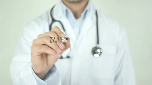 Doctor Writes Infection on Transparent Surface