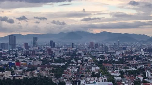 shot of mexico city downtown during sunset on a cloudy day