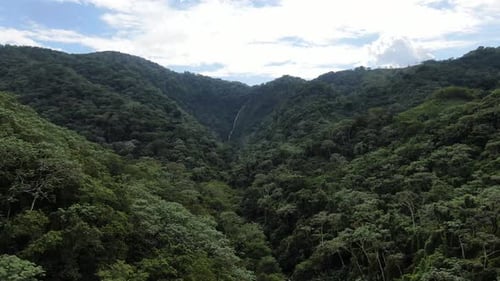 Tropical Mountain With Long, Narrow Waterfall