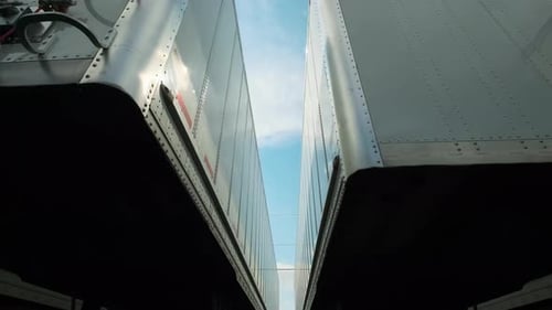 Many Trucks Trailer Stand in the Parking Lot