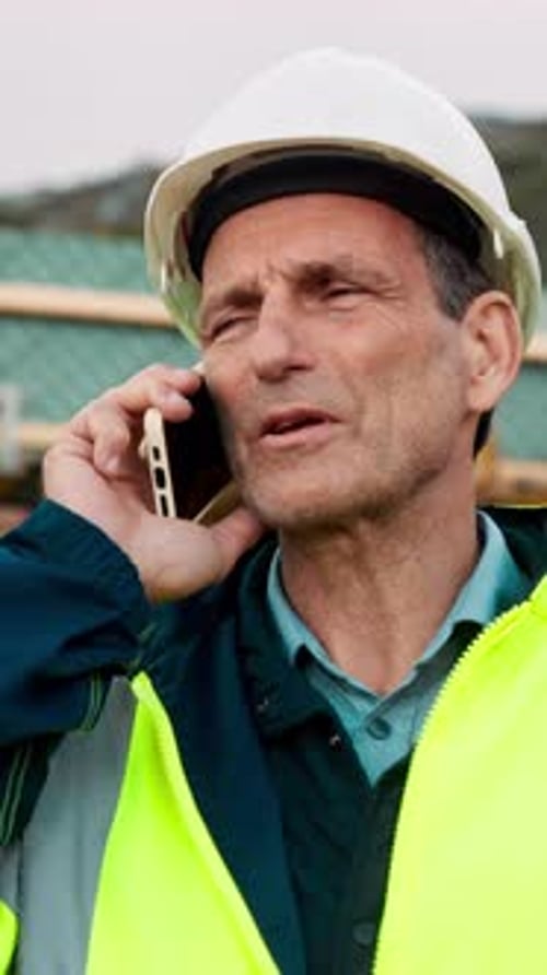 Construction, maintenance or man on site with phone call, task brief or inspection update in chat