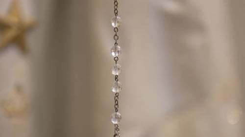 Hanging Rosary Beads with Cross Close-up