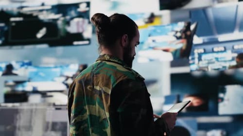 Man Using Tablet in Futuristic Technology Office