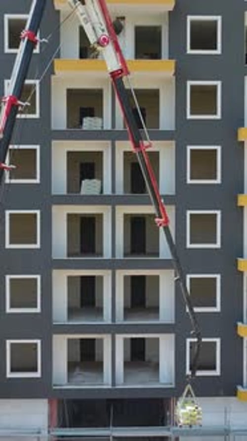 Vertical Video HighRise Construction Showcase Facade Updates and Material Flow on Multiple Floors