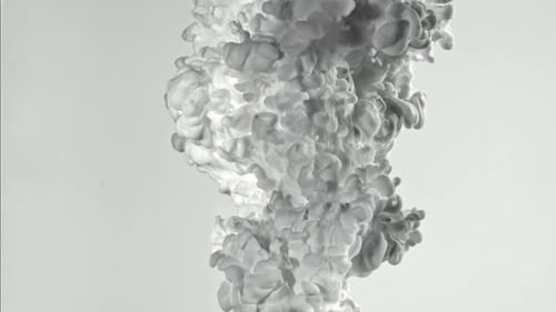 White Paint in Water on a White Background Filmed on a Highspeed Camera at 1000 Fps