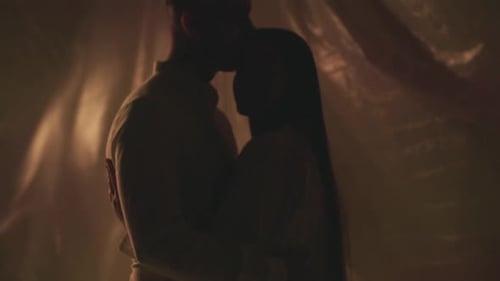 Slo Motion of Hugging Couple in Studio Turning Off Light on Background Young Boyfriend Sensual