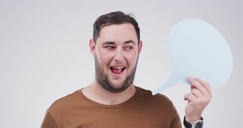 Smiling Young Adult Holding Speech Bubble Prop