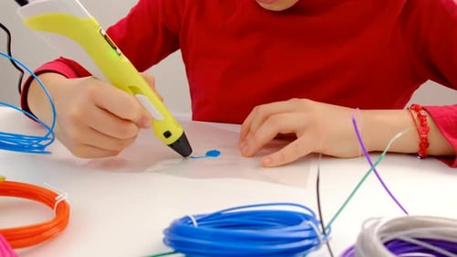 Child Uses 3D Printing Pen for Art
