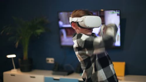 Boy Playing Video Games with Virtual Reality Headset