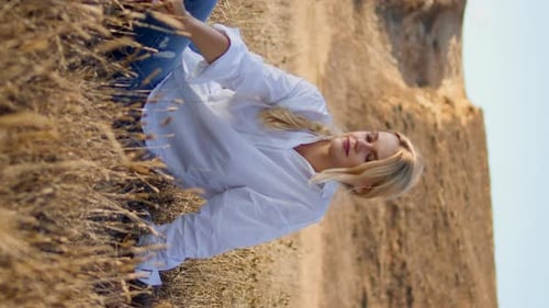 Contemplative Girl Sitting Field Alone Blonde Woman Putting Spikelet Hairstyle