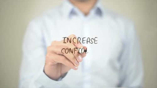 Increase Confidence Man Writing on Transparent Screen