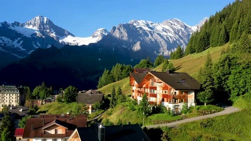 Cinematic drone shot of Murren, a traditional Walser mountain village in the Bernese Highlands of Sw