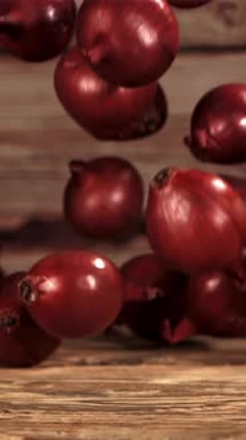 Onion Falls on the Table Filmed is Slow Motion 1000 Fps